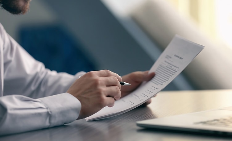 business man looking at document