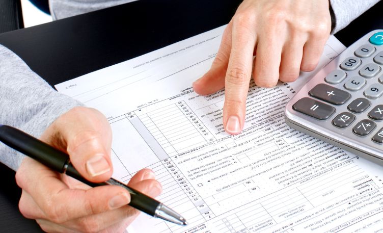 tax service reviewing documents