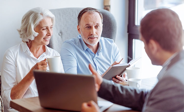 couple sitting down with social security rep
